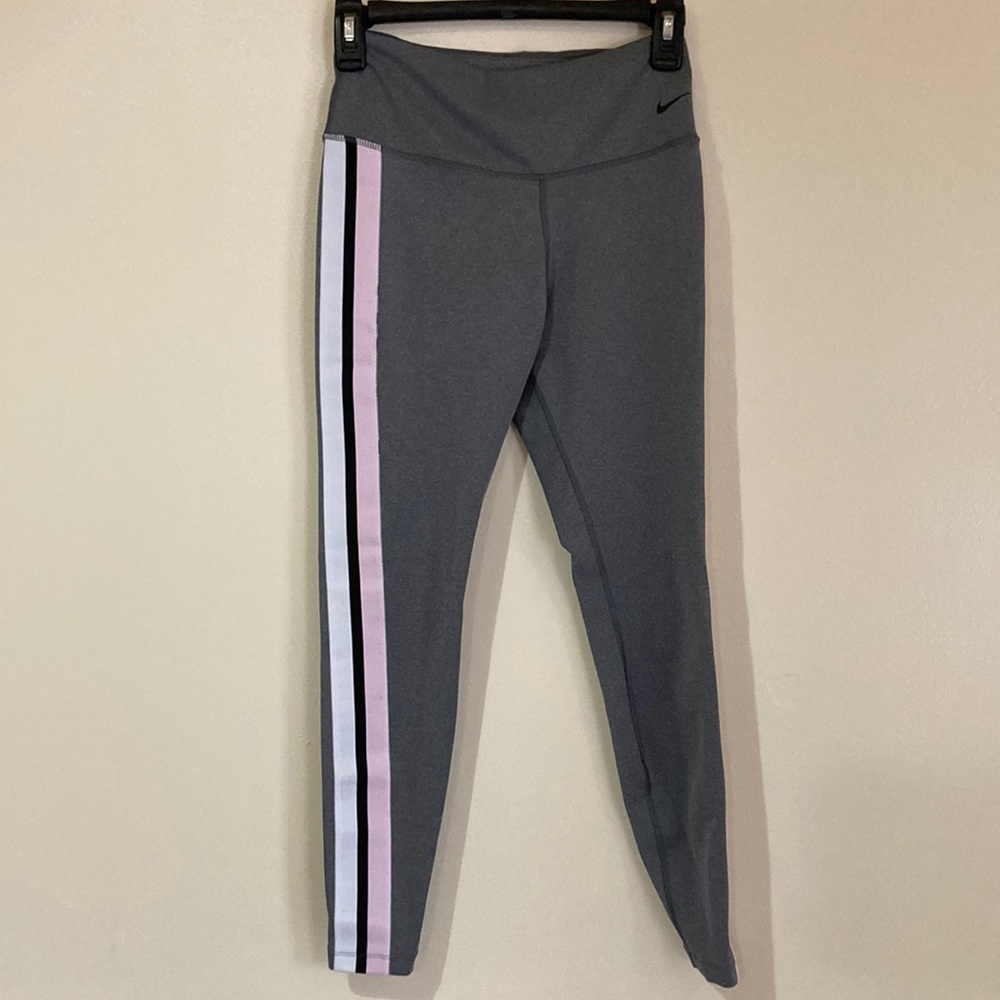 Nike Dri Fit leggings with pink and white stripes on sides